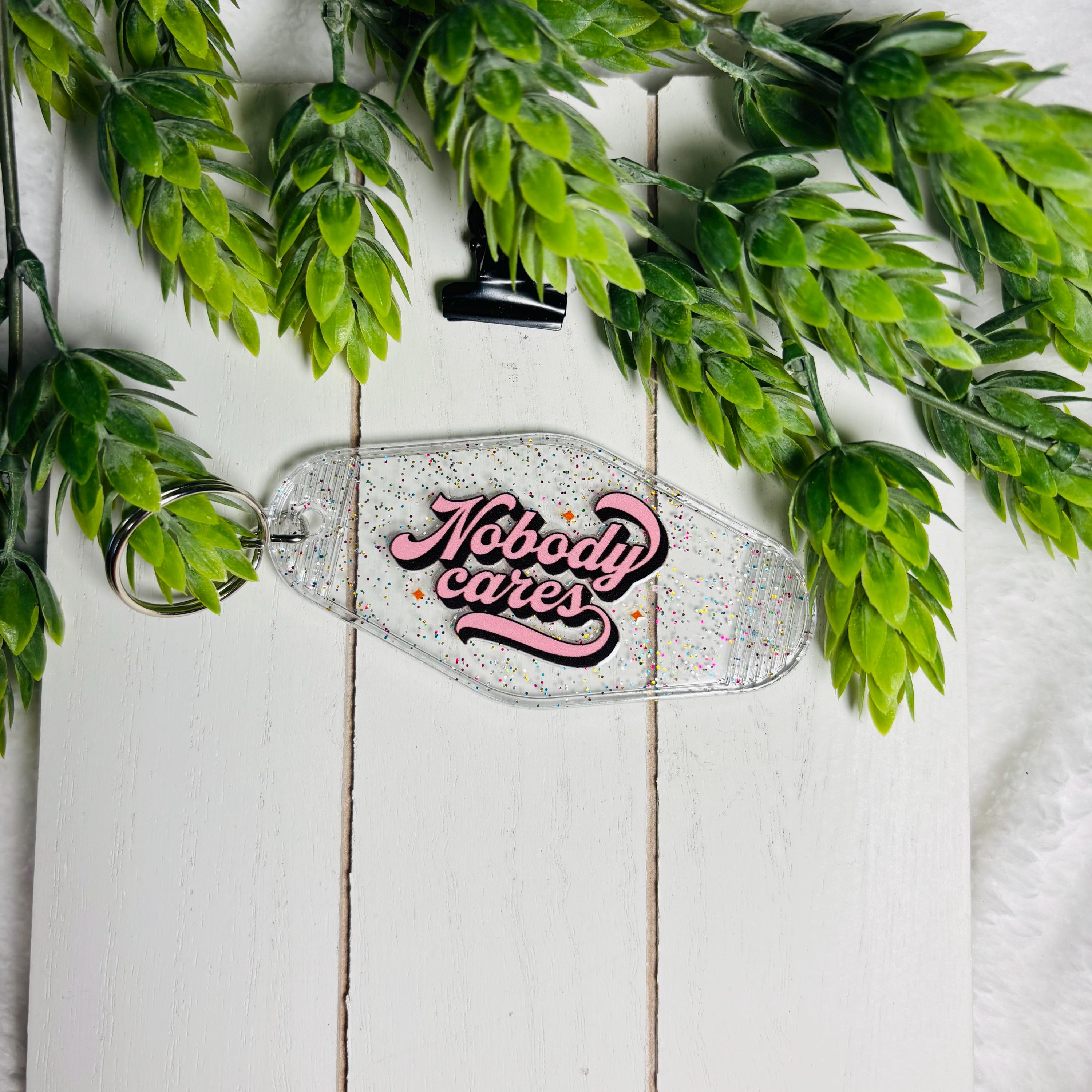 Nobody Cares Motel Keychain – Glitter Retro Acrylic Key Tag