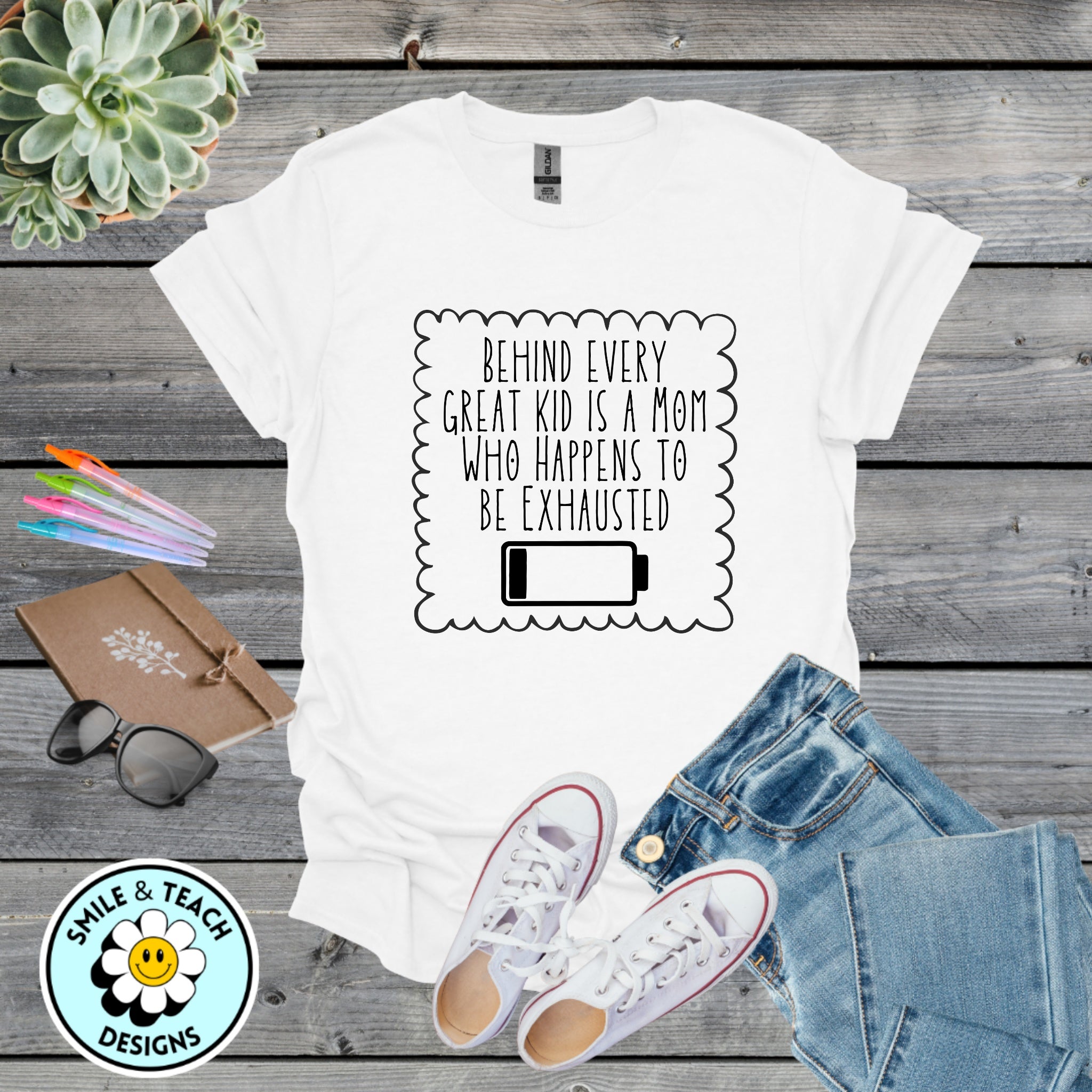 Behind Every Great Kid Is a Mom Who Happens to Be Exhausted – T Shirt